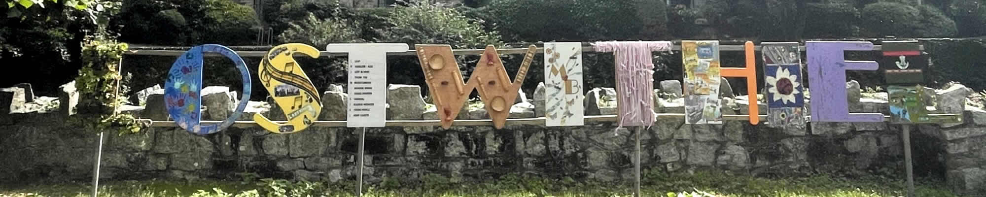 Lostwithiel Sign by the river bank